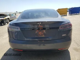 2016 Tesla Model S 90D with VIN 5YJSA1E22GF177120, listed as a Copart auction lot 51972885 with 73,441 mi miles and Salvage title. Bid and sale history available at DreamBid. Image 6.