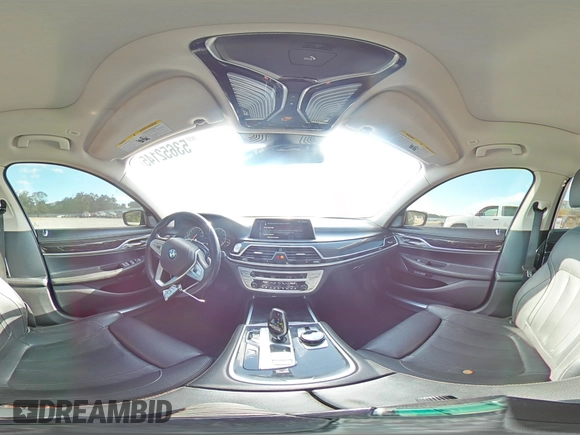 2017 BMW 7 Series 740i with VIN WBA7E2C57HG739482, listed as a Copart auction lot 53652145 with 102,418 mi miles and Salvage title. Bid and sale history available at DreamBid. Image 15.