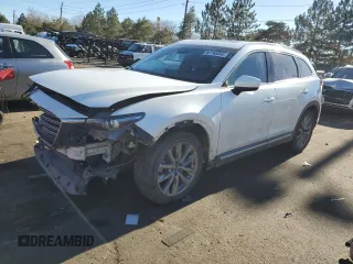 2020 Mazda CX-9 Grand Touring with VIN JM3TCBDY8L0402974, listed as a Copart auction lot 82790654 with 105,220 mi miles and Salvage Title. Bid and sale history available at carsss.com. Image 1.