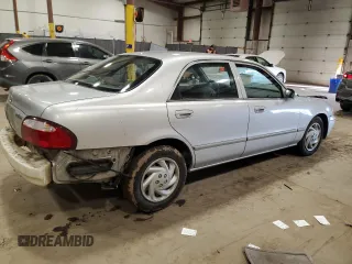 2000 Mazda 626 LX with VIN 1YVGF22C1Y5125842, listed as a Copart auction lot 45637895 with 84,487 mi miles and Salvage Title. Bid and sale history available at carsss.com. Image 3.