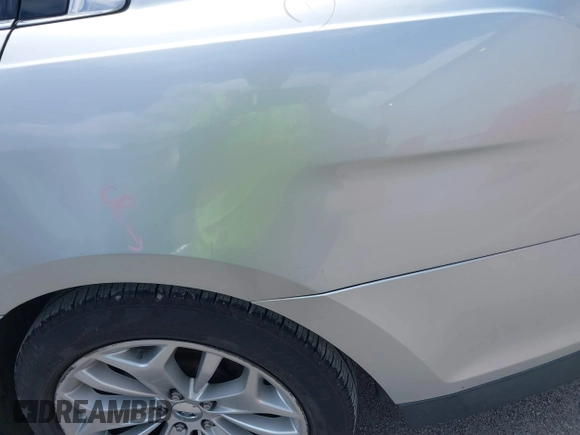 2013 Ford Taurus Limited with VIN 1FAHP2F8XDG117448, listed as a IAAI auction lot 39585596 with 150,747 mi miles and . Bid and sale history available at DreamBid. Image 16.