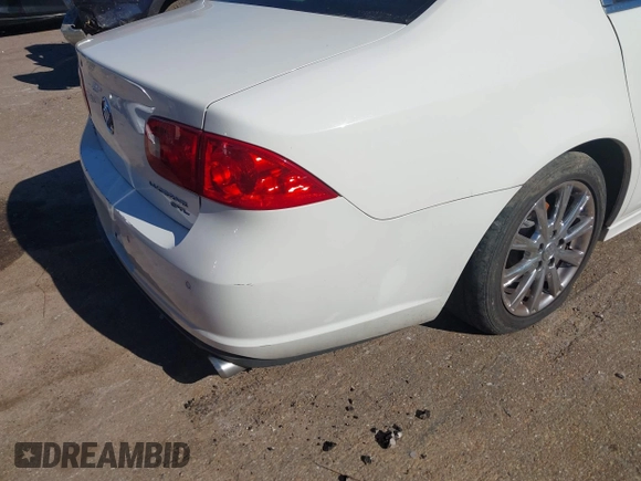 2011 Buick Lucerne CXL Premium with VIN 1G4HJ5EM7BU133189, listed as a IAAI auction lot 41340999 with 213,167 mi miles. Bid and sale history available at carsss.com. Image 14.