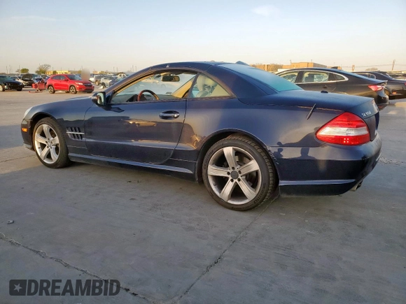 2009 Mercedes-Benz SL 550 z VIN WDBSK71F69F142599, wystawiony jako Copart lot #50241095 z przebiegiem 58 416 mil mil oraz Szkoda całkowita • Salvage title. Historia ofert i sprzedaży dostępna na DreamBid. Obrazek 2.