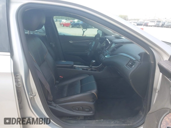 2014 Chevrolet Impala LT with VIN 2G1125S39E9313542, listed as a IAAI auction lot 41988420 with 227,093 mi miles and . Bid and sale history available at DreamBid. Image 5.