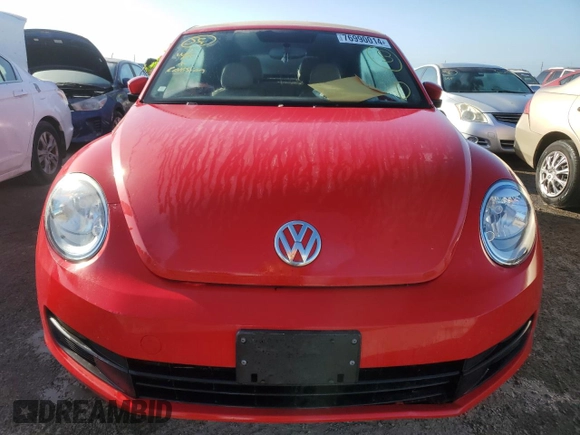 2014 Volkswagen Beetle 1.8T w/Premium z VIN 3VW517AT9EM819966, wystawiony jako Copart lot #76990014 z przebiegiem Nie podano mil oraz Nie do naprawy • Non repairable. Historia ofert i sprzedaży dostępna na DreamBid. Obrazek 5.