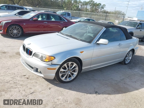 2004 BMW 3 Series 330Ci with VIN WBABW534X4PL45274, listed as a IAAI auction lot 41437124 with 124,001 mi miles. Bid and sale history available at carsss.com. Image 2.