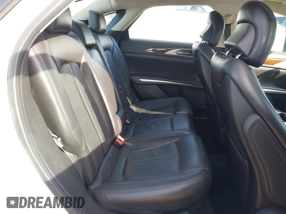 2014 Lincoln MKZ with VIN 3LN6L2GKXER817659, listed as a IAAI auction lot 40896691 with 84,164 mi miles and . Bid and sale history available at DreamBid. Image 8.