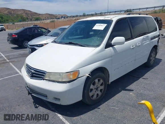 2003 Honda Odyssey EX-L z VIN 5FNRL18033B095684, wystawiony jako IAAI lot #42289617 z przebiegiem 174 336 mil mil oraz . Historia ofert i sprzedaży dostępna na DreamBid. Obrazek 17.