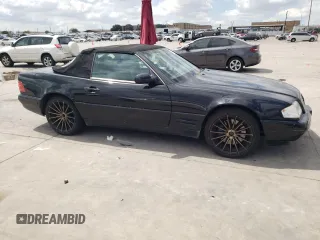 1999 Mercedes-Benz SL-Class with VIN WDBFA68F0XF182162, listed as a Copart auction lot 71390714 with 111,152 mi miles and Salvage Title. Bid and sale history available at carsss.com. Image 4.