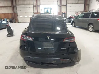 2022 Tesla Model Y Long Range z VIN 7SAYGDEE0NF342215, wystawiony jako IAAI lot #42136858 z przebiegiem 53 037 mil mil oraz . Historia ofert i sprzedaży dostępna na DreamBid. Obrazek 15.
