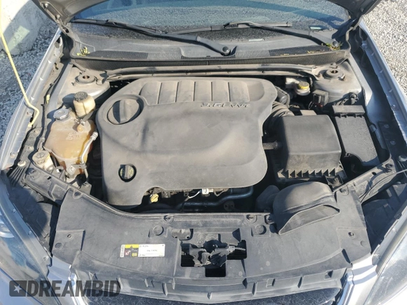 2013 Chrysler 200 Touring z VIN 1C3CCBBG7DN723383, wystawiony jako Copart lot #53302135 z przebiegiem 139 637 mil mil oraz Szkoda całkowita • Salvage title. Historia ofert i sprzedaży dostępna na DreamBid. Obrazek 11.