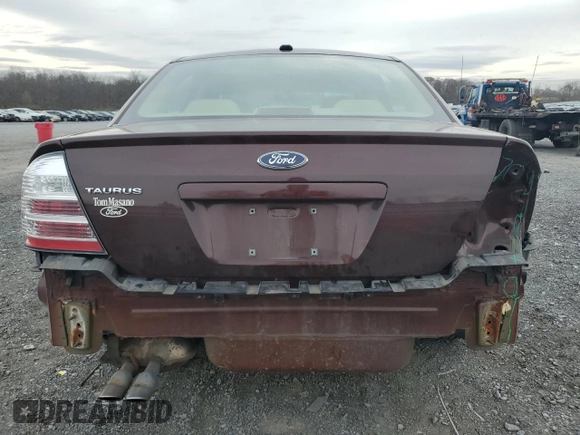 2009 Ford Taurus SE with VIN 1FAHP23W89G125025, listed as a Copart auction lot 80710004 with 114,176 mi miles and Salvage Title. Bid and sale history available at carsss.com. Image 6.