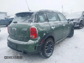 2015 MINI Countryman S z VIN WMWZC5C59FWP48946, wystawiony jako IAAI lot #41298127 z przebiegiem 106 293 mil mil oraz . Historia ofert i sprzedaży dostępna na DreamBid. Obrazek 4.