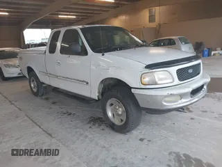 1997 Ford F-150 XL with VIN 1FTDX1861VNA65140, listed as a IAAI auction lot 42086211 with 412,065 mi miles. Bid and sale history available at carsss.com. Image 1.