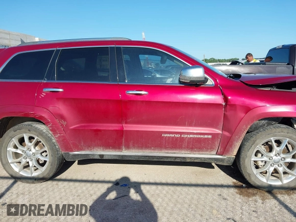 2015 Jeep Grand Cherokee Summit with VIN 1C4RJEJG9FC100568, listed as a IAAI auction lot 42512705 with 128,413 mi miles and . Bid and sale history available at DreamBid. Image 13.