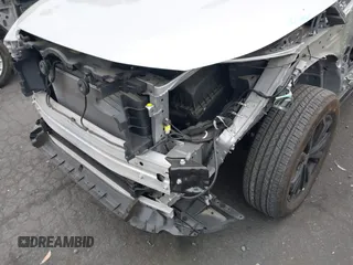 2022 Toyota RAV4 Hybrid SE z VIN 4T3T6RFV9NU070229, wystawiony jako IAAI lot #42565070 z przebiegiem 21 901 mil mil oraz . Historia ofert i sprzedaży dostępna na DreamBid. Obrazek 6.