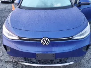 2021 Volkswagen ID.4 Pro S z VIN WVGKMPE27MP058308, wystawiony jako Copart lot #49283695 z przebiegiem Nie podano mil oraz Szkoda całkowita • Salvage title. Historia ofert i sprzedaży dostępna na DreamBid. Obrazek 12.
