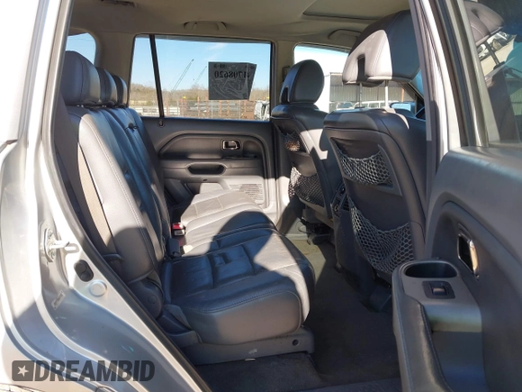 2006 Honda Pilot EX-L with VIN 5FNYF18786B030253, listed as a IAAI auction lot 41708620 with 146,713 mi miles and . Bid and sale history available at DreamBid. Image 8.