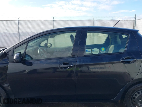 2014 Toyota Yaris L with VIN JTDKTUD36ED586456, listed as a IAAI auction lot 41888730 with 92,742 mi miles. Bid and sale history available at carsss.com. Image 14.