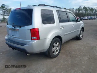 2009 Honda Pilot EX-L with VIN 5FNYF48559B034121, listed as a IAAI auction lot 41928138 with 193,969 mi miles. Bid and sale history available at carsss.com. Image 4.