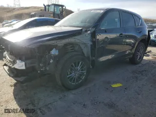 2021 Mazda CX-5 Touring with VIN JM3KFBCM6M0317800, listed as a Copart auction lot 48506125 with 33,746 mi miles and Salvage Title. Bid and sale history available at carsss.com. Image 1.