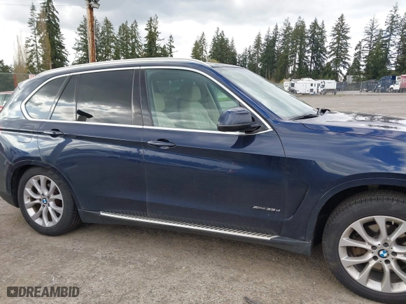 2015 BMW X5 xDrive35d with VIN 5UXKS4C55F0J98874, listed as a IAAI auction lot 42030583 with 151,079 mi miles. Bid and sale history available at carsss.com. Image 13.