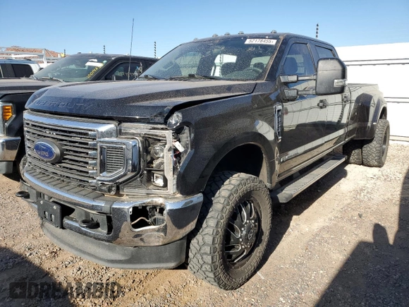 2022 Ford F-350 XL with VIN 1FT8W3DT9NEC09111, listed as a Copart auction lot 52178455 with 128,690 mi miles and Salvage title. Bid and sale history available at DreamBid. Image 1.