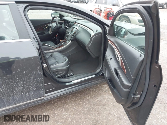 2013 Buick LaCrosse Premium 1 z VIN 1G4GF5E37DF174904, wystawiony jako IAAI lot #41544879 z przebiegiem 157 979 mil mil oraz . Historia ofert i sprzedaży dostępna na DreamBid. Obrazek 5.