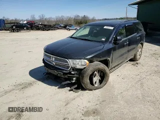 2013 Dodge Durango Crew z VIN 1C4RDJDG1DC675594, wystawiony jako Copart lot #53536775 z przebiegiem 194 243 mil mil oraz Szkoda całkowita • Salvage title. Historia ofert i sprzedaży dostępna na DreamBid. Obrazek 14.