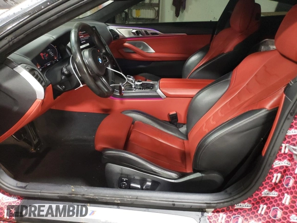 2019 BMW 8 Series M850i xDrive with VIN WBABC4C50KBU95710, listed as a Copart auction lot 85099404 with 58,463 mi miles and Salvage title. Bid and sale history available at DreamBid. Image 7.