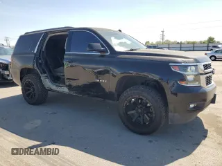 2015 Chevrolet Tahoe LT with VIN 1GNSCBKC2FR115942, listed as a Copart auction lot 54125655 with 132,502 mi miles and Salvage title. Bid and sale history available at DreamBid. Image 4.