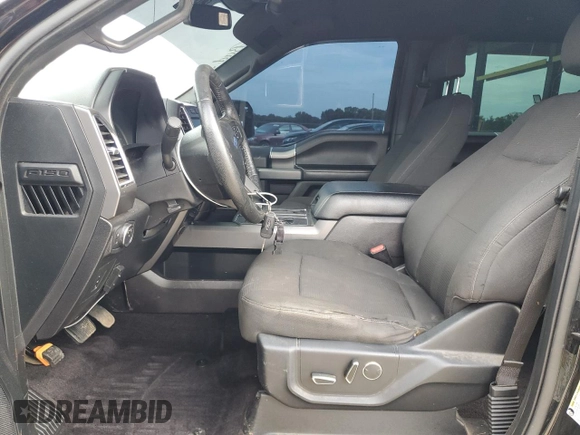 2016 Ford F-150 XLT with VIN 1FTEW1EG8GKF63229, listed as a Copart auction lot 60820565 with 145,965 mi miles and Salvage title. Bid and sale history available at DreamBid. Image 7.
