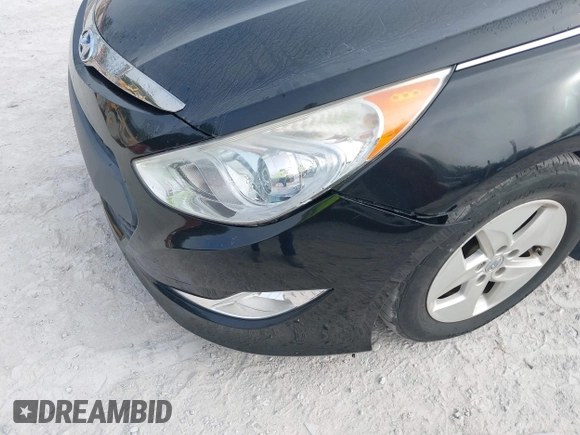 2012 Hyundai Sonata Hybrid with VIN KMHEC4A41CA054312, listed as a IAAI auction lot 42124397 with 49,581 mi miles and . Bid and sale history available at DreamBid. Image 6.