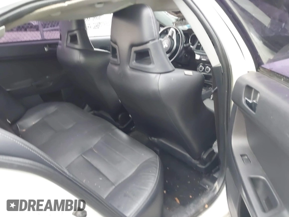 2014 Mitsubishi Lancer Evolution GSR with VIN JA32W8FV5EU012572, listed as a IAAI auction lot 40871463 with 89,529 mi miles. Bid and sale history available at carsss.com. Image 8.