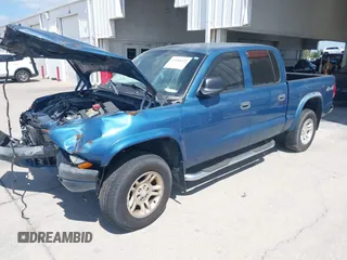 2004 Dodge Dakota Sport z VIN 1D7HG38N84S709758, wystawiony jako IAAI lot #42168491 z przebiegiem 238 479 mil mil oraz . Historia ofert i sprzedaży dostępna na DreamBid. Obrazek 2.