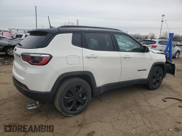 2019 Jeep Compass Altitude with VIN 3C4NJCBB4KT618673, listed as a Copart auction lot 51801955 with 104,784 mi miles and Salvage title. Bid and sale history available at DreamBid. Image 3.