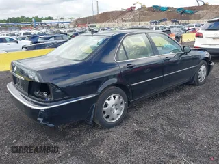 2004 Acura RL w/Navigation System with VIN JH4KA96624C003779, listed as a IAAI auction lot 39542033 with 80,018 mi miles. Bid and sale history available at carsss.com. Image 4.