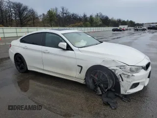 2016 BMW 4 Series 428i xDrive with VIN WBA4C9C58GG136718, listed as a Copart auction lot 55225815 with 169,356 mi miles and Salvage title. Bid and sale history available at DreamBid. Image 4.