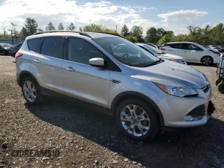 2016 Ford Escape SE с VIN 1FMCU9GX9GUA34638, выставлен на аукционе Copart как лот 55757955 с пробегом 55 143 миль миль и Списание • Salvage title. История ставок и продаж доступна на DreamBid. Изображение 4.