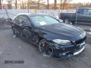 2015 BMW 5 Series 535i xDrive with VIN WBA5B3C55FD548566, listed as a IAAI auction lot 38795042 with 67,985 mi miles. Bid and sale history available at carsss.com. Image 1.