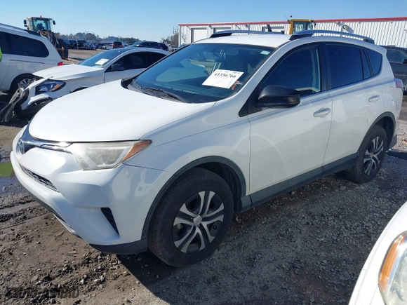 2016 Toyota RAV4 LE with VIN JTMZFREV6GD085086, listed as a IAAI auction lot 41356766 with 122,465 mi miles. Bid and sale history available at carsss.com. Image 17.