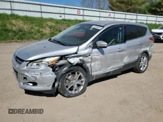 2013 Ford Escape SEL z VIN 1FMCU9H9XDUB69879, wystawiony jako Copart lot #56580885 z przebiegiem 54 981 mil mil oraz Nie do naprawy • Non repairable. Historia ofert i sprzedaży dostępna na DreamBid. Obrazek 1.