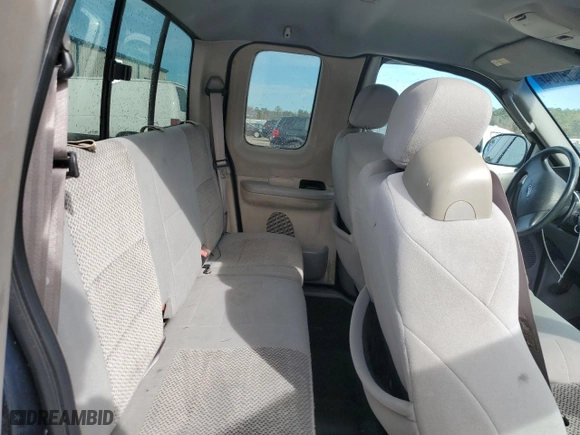 2003 Ford F-150 XL with VIN 1FTRX07273KB66549, listed as a Copart auction lot 83552004 with 205,026 mi miles and Salvage Title. Bid and sale history available at carsss.com. Image 10.
