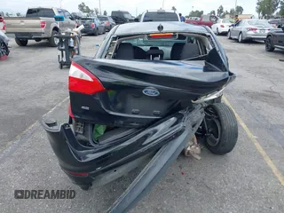 2014 Ford Fiesta SE z VIN 3FADP4BJ0EM216922, wystawiony jako IAAI lot #42255776 z przebiegiem 87 371 mil mil oraz . Historia ofert i sprzedaży dostępna na DreamBid. Obrazek 17.