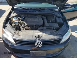 2014 Volkswagen Jetta SE z VIN 3VWD17AJ8EM424820, wystawiony jako Copart lot #63942515 z przebiegiem 180 530 mil mil oraz Czysty tytuł • Clean title. Historia ofert i sprzedaży dostępna na DreamBid. Obrazek 11.