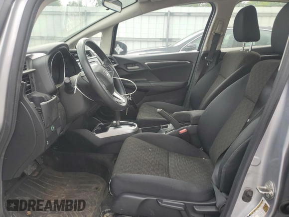 2017 Honda Fit LX with VIN JHMGK5H5XHS006599, listed as a Copart auction lot 62881415 with 58,381 mi miles and Clean title. Bid and sale history available at DreamBid. Image 7.