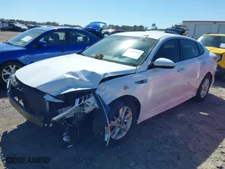 2016 Kia Optima LX with VIN 5XXGT4L34GG069088, listed as a IAAI auction lot 41829114 with 142,760 mi miles. Bid and sale history available at carsss.com. Image 18.