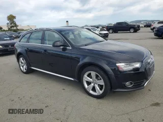 2014 Audi allroad Prestige with VIN WA1VFAFL9EA104266, listed as a Copart auction lot 52453415 with 94,011 mi miles and Salvage Title. Bid and sale history available at carsss.com. Image 4.