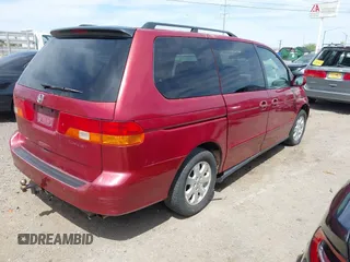 2003 Honda Odyssey EX-L with VIN 5FNRL189X3B135872, listed as a IAAI auction lot 42035948 with Not Provided miles and . Bid and sale history available at DreamBid. Image 4.