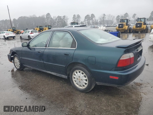 1996 Honda Accord EX with VIN 1HGCD5656TA174575, listed as a Copart auction lot 86435334 with 217,784 mi miles and Salvage Title. Bid and sale history available at DreamBid. Image 2.